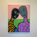 Abstract artwork of two faces embracing on a colorful background