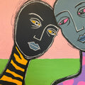 Abstract artwork with colorful faces and geometric shapes