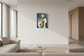 Abstract artwork of two faces on a white wall