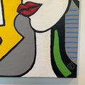 Abstract painting with geometric shapes and bold colors on a textured surface.