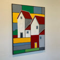Abstract art piece with geometric shapes in various colors on a white background