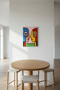 Abstract painting with colorful shapes on a beige wall