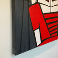 Abstract art piece with red, black, and white colors on a white background